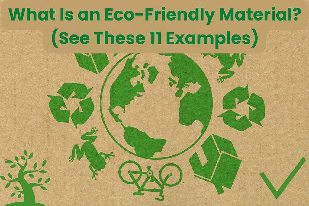 A cartoon drawing of the earth in green on a brown "cardboard-textured" background. There are eco-friendly symbols arranged around the earth, including recycling arrows, a frog, a green house, and a bicycle. The words "What Is an Eco-Friendly Material? (See These 11 Examples)" are written across the top in green letters. There is a green cartoon tree in the bottom left corner and a tick (or check mark) in the bottom right.