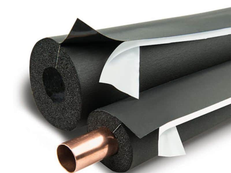 Armacell Tube Insulation with Reinforced Lap Seal. There are two lengths of black foam insulation, one of which is wrapped around a copper pipe. The foam can be seen in the end cross-section. The outer shell is smooth.