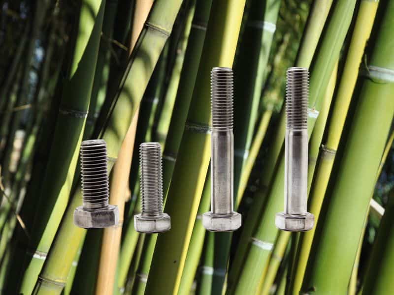 Green bamboo culms with an image of metal bolts overlain.