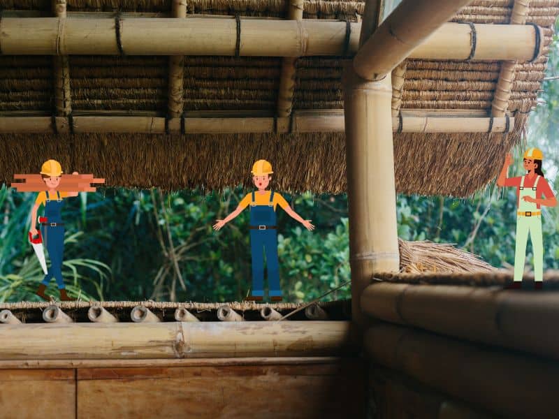 A picture of a bamboo roof with cartoon builders wearing blue overalls and yellow hardhats. The builder in the middle has his hands extended as if asking a question.