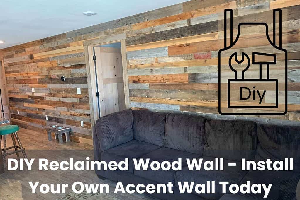 A DIY reclaimed wood wall with planks of various shades ranging from light brown, gray through to black and the occasional red. Downlights are in the ceiling, a wooden floor, and a black sofa against the wall. There is also an open door in the middle of the wall. Across the bottom are the words "DIY Reclaimed Wood Wall - Install Your Own Accent Wall Today." In the top right corner is a cartoon toolbox with the letters "DIY" on the side and a spanner and hammer poking out.