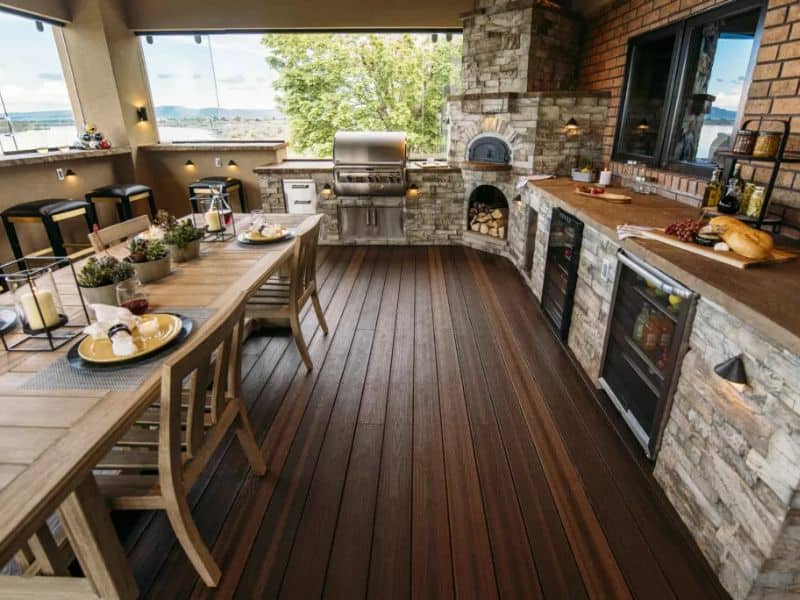 A stylish kitchen boasting one of Envision Composite Lumber's composite wood product on the floor.