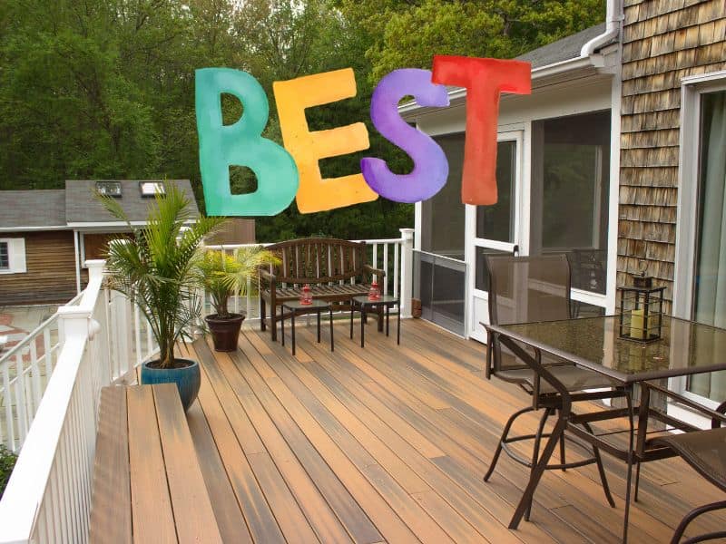 A wood-plastic composite deck with outdoor furniture and plant pots arranged on it. Across the top is the word "best," written in colorful capital letters in a "hand-painted" font.