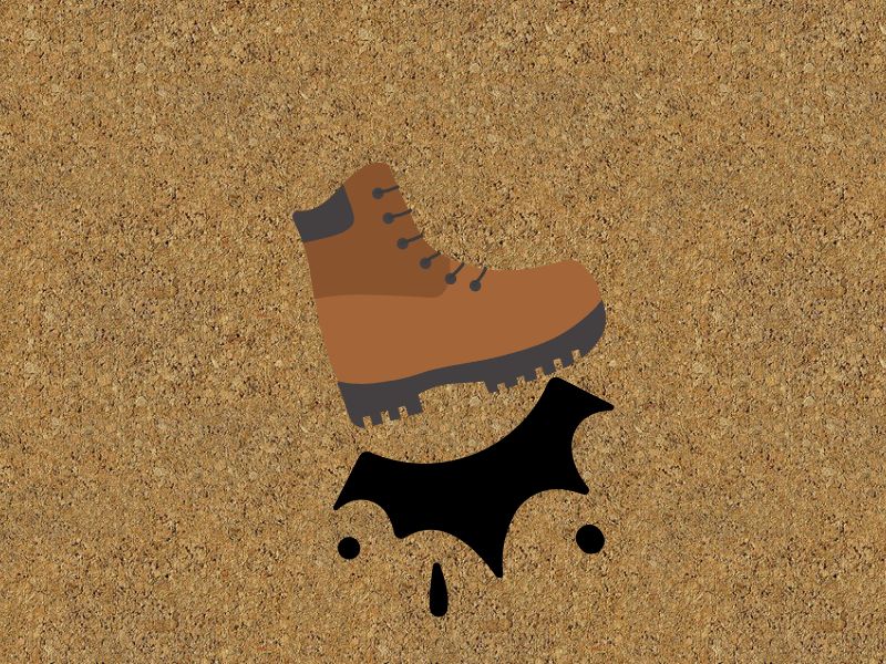 A cork floor is hit with a walking boot and the impact can be seen with a cartoon impact mark.