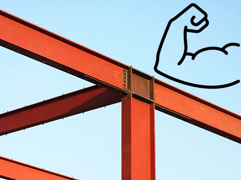 A steel frame painted red against a blue sky. In the top right corner of the image is an outline of a muscular arm flexing its bicep.