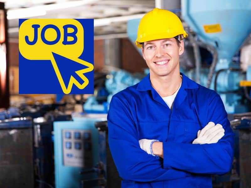 A worker wearing blue overalls and a yellow hard hat smiles in front of a workshop. In the top right of the image is a yellow and blue graphic with the word "job" and a mouse pointer.