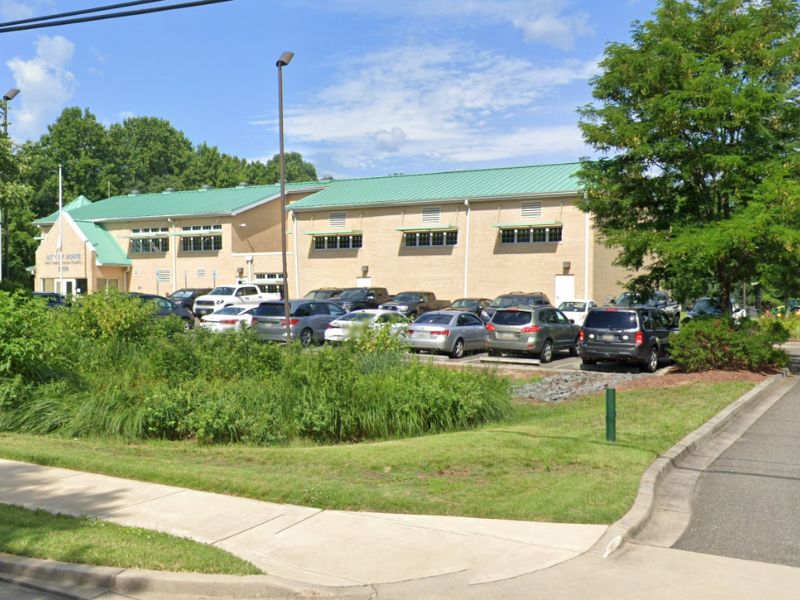 A photograph of The Parks and Grounds Building.