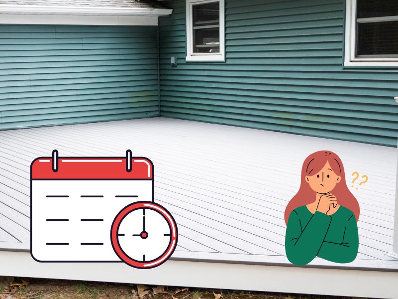 A light gray composite deck outside a home with blue siding and white window frames. In the bottom left of the image is a calendar icon with a clock face in the corner, and in the bottom right is a cartoon woman with ginger hair and wearing a green top with yellow question marks by her head.